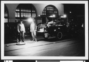 Maintenance truck workers checking a sewer line, ca.1940