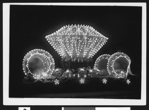 Float in Shriner's electrical parade, in the shape of a diamond, ca.1910