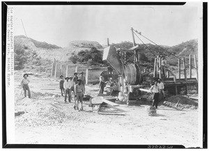 Workers putting in cement piers, Soledad Syphon, Los Angeles Aqueduct construction