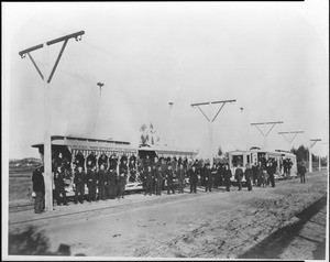 Celebrators and streetcars during the opening of the Pico Heights Electric Railway, 1887