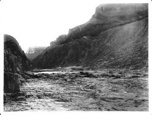 Looking east on the Colorado River at the rapids above Bass's Ferry, Grand Canyon, ca.1900-1930