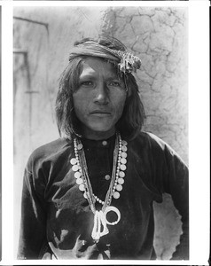 Portrait of a Hopi Indian boy from a wealthy family, ca.1900