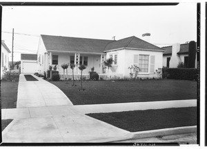 Exterior view of a house on a residential street in Los Angeles