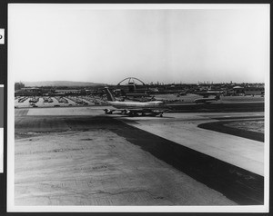 View of an airplane on the runway of the Los Angeles International Airport, in February 1971