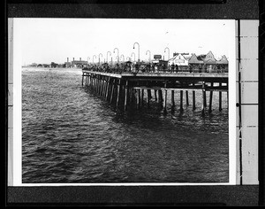 People fishing off the side of the Redondo Beach pier, ca.1940