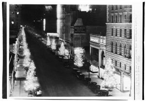 View looking south on Flower Street from West Seventh Street, showing "Christmas Out-of Doors", 1931