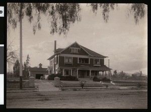 Exterior view of a large house in San Bernardino, ca.1900
