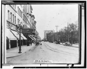 Automobiles parked on Fifth Street between the Auditorium and Central Park