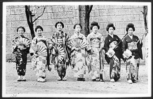 Seven women in oriental dresses