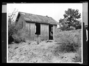 Exterior view of an old cabin in Dry Town, ca.1930