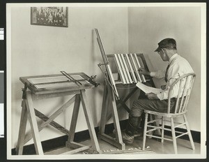 Close up of an engineer/draftsman (?) at work, ca.1920