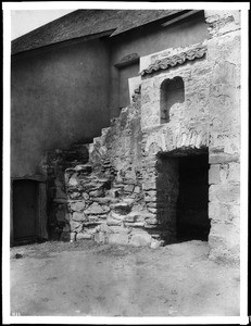 Exterior stairs to the belfry at Mission Carmel (San Carlos Borromeo de Carmelo) in Carmel, ca.1903