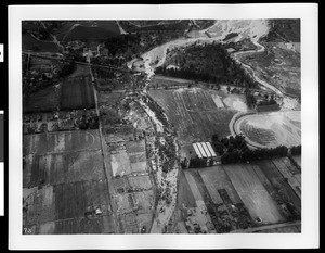 Aerial view of flooded area of Covina and El Monte Highway, 1938