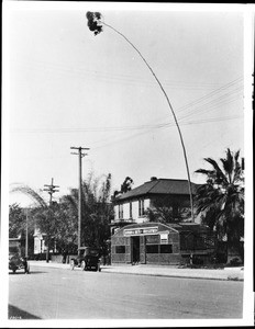 View of the northwest corner of Olive Street and Ninth Street, ca.1910