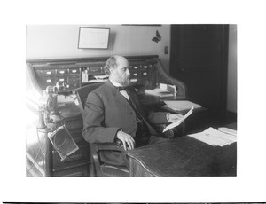 Portrait of James A. Foshay (1856-1914) at his desk, ca.1902