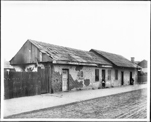 External view of an adobe house, in Sonora town on the east side of Castelar Street, 1895