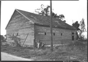 Exterior view of an unidentified wooden cabin