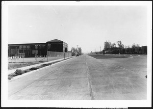 Vview of 98th Street looking east from Figueroa Street after construction of double roadway pavement