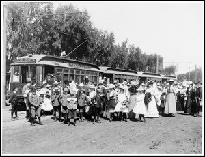 Crowd of people gathered for opening day of the electric car line in Santa Monica, April 1, 1896