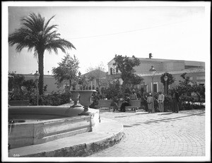 Six people near the fountain in the Plaza de Armas, Guaymas, Sonora, Mexico, ca.1906