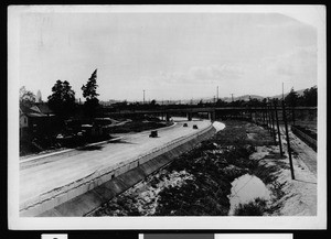 Large roadway looking west, showing what will later be the site of the San Bernardino Freeway, 1930-1939