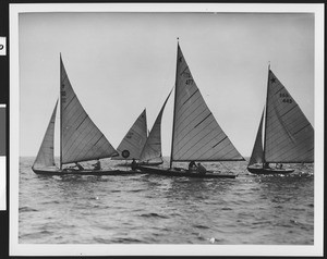 Four sailboats at close range of each other, ca.1940