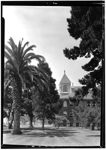 Exterior view of Old College at the University of Southern California, showing freshly mown grass, July 1927