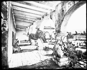 View of the front corridor at San Juan Capistrano Mission looking north, ca.1886