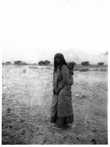 Pima Indian woman carrying her baby on her back, Gila River Reservation, ca.1902