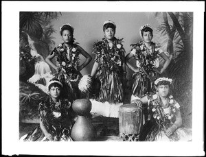 Group of native Hawaiian hula dancing girls and musicians, Hawaii, 1907