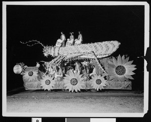 Grasshopper float in the Shriner's electrical parade, ca.1910