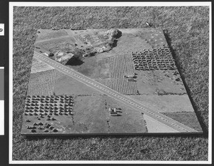 Model of a camouflaged military installation and runway during World War II, ca.1939