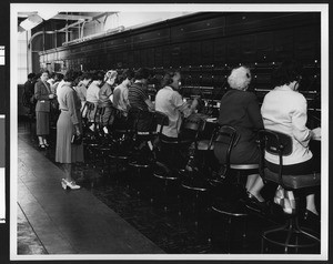 View of operators at the General Telephone Company switchboard, ca.1940-1950