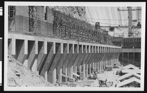 Construction of Boulder Dam, showing work behind the dam, ca.1930