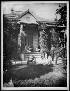 View of the Hazard family in front of their home on Broadway, ca.1880