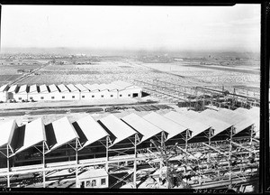 Industrial buildings seen from the water tower of the Consolidated Steel Company on Slauson Avenue, December 1930