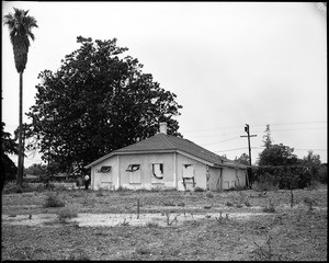 Exterior view of the Evertsen Adobe in San Gabriel, shown from the rear lot, July 22, 1960