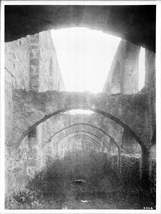 Long row of architectural arches at the monastery at the Mission San Jose, San Antonio, Texas, ca.1900