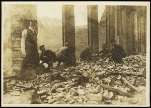San Francisco earthquake damage, showing people placing dynamite among the ruins, 1906