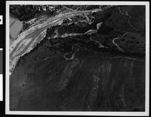 Aerial view of flooded mountainous region near Los Angeles, 1938