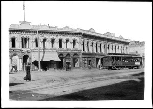 View of the Downey Block in Los Angeles at the site of the Post Office, shown from across the street, 1900