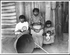 Yokut Indian women basket maker and two children, Tule River Reservation near Porterville, California, ca.1900