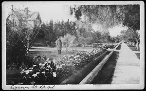 Man standing in the front yard of a home on Figueroa Street, ca.1880-1889