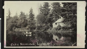 People boating on the Necanicum River in Seaside, Oregon