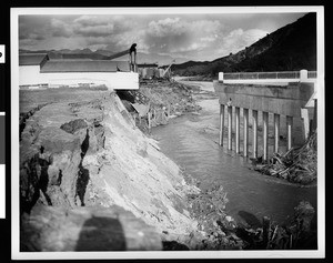 Flood damage to a bridge and Warner Brothers Studio (?), 1938