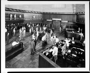 Interior view of the Los Angeles (later Pacific Coast) Stock Exchange on Spring Street in Los Angeles