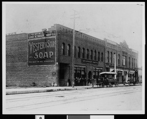 Exterior view of the Los Angeles Soap Company building with personnel and John A. Forthmann Senior, March 17, 1899