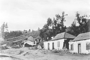 View of North Spring Street looking south from Sunset Boulevard, showing several adobes in Sonora Town, ca.1915