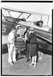 Inauguration of the Air Express Service, showing women shipping their pearls, August 31, 1927