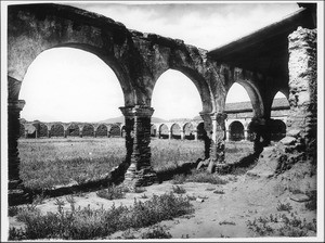 Mission San Juan Capistrano, showing arches from the southwest side, California, ca.1900